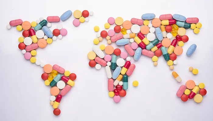 Världskarta som bildas av tabletter.