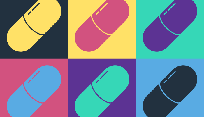 Dekorationsbild: Tecknade piller i olika färger